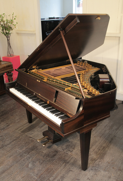 A 1932, Neo-Bechstein electric grand piano with a mahogany case