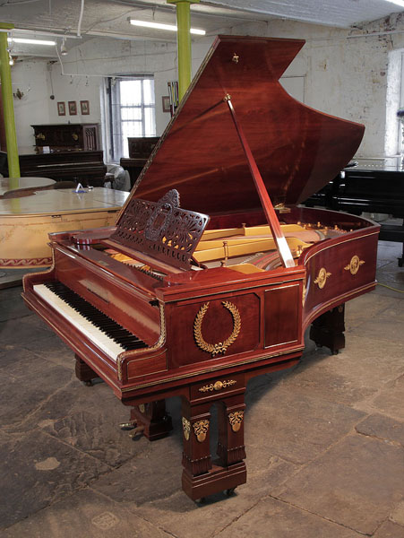 Empire style, 1901, Ibach model 2 grand piano for sale with a mahogany case and gate legs. Entire cabinet decorated with ormolu mounts depicting scenes of greek gods, goddesses and wreaths