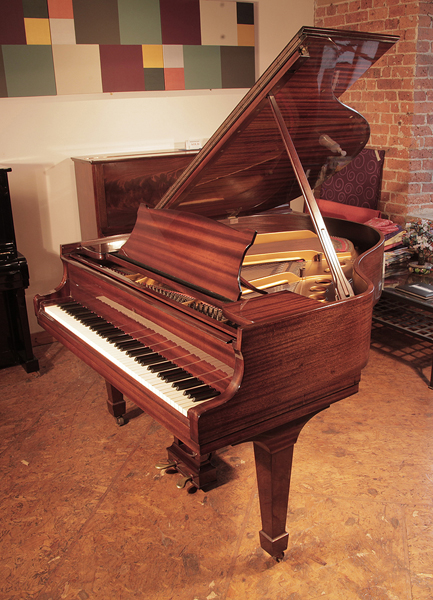 Reconditioned, 1966, Steinway Model S baby grand piano with a mahogany case and spade legs. Piano has an eighty-eight note keyboard and a two-pedal lyre. 