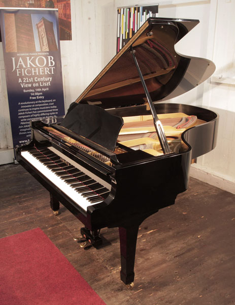 Reconditioned, 1984, Yamaha G5 grand piano for sale with a black case and spade legs. Piano has an eighty-eight note keyboard and a two-pedal lyre.  